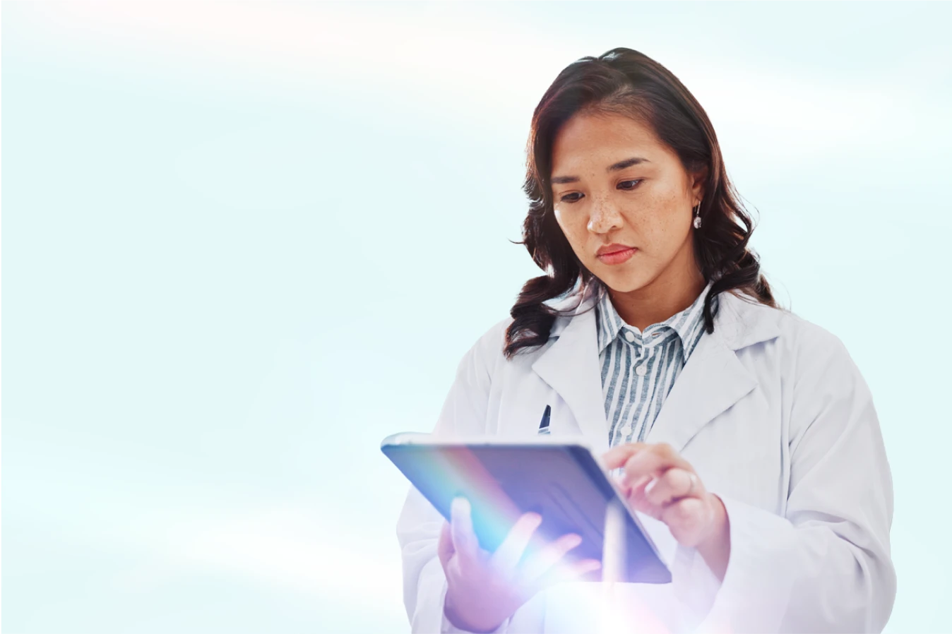 doctor-ipad 1 Saga Pathlight Doctor Woman looking at her ipad